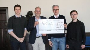 Handing over donation